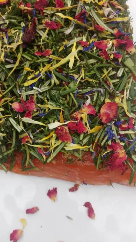 Salmon marinated with rosemary, dill and flower mix