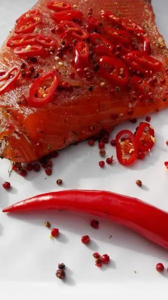 Salmon marinated with pink berries and chilli (slightly spicy)