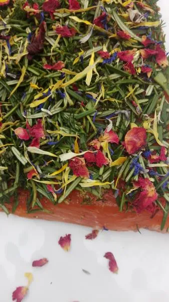 Salmon marinated with rosemary, dill and flower mix