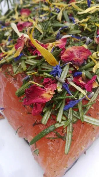 Salmon marinated with rosemary, dill and flower mix