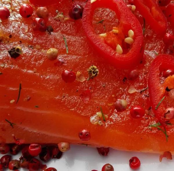 Salmon marinated with pink berries and chilli (slightly spicy)